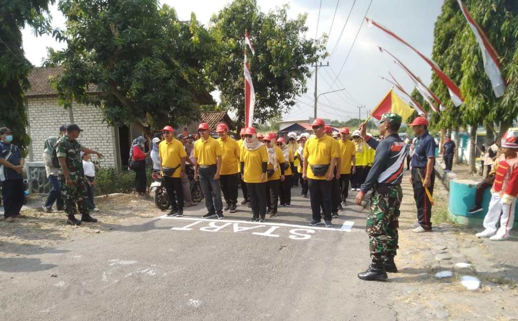 Koramil Ngusikan Kawal Gerak Jalan